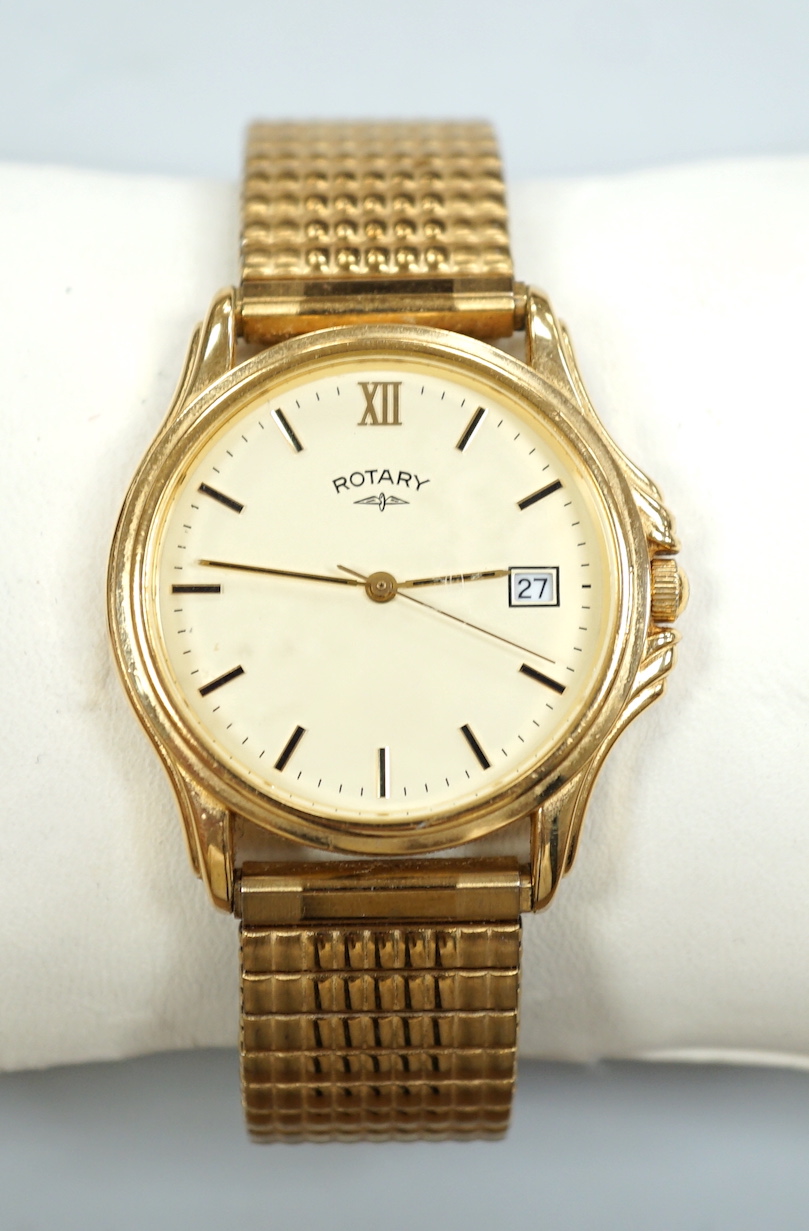 A gentleman's modern steel and gold plated Rotary quartz wrist watch, with date aperture, on associated flexible bracelet, with Rotary box.